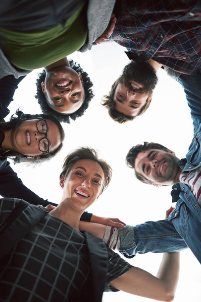 Circle of creative minds. Cropped shot of a group of creative businesspeople in a huddle. - 写真・画像