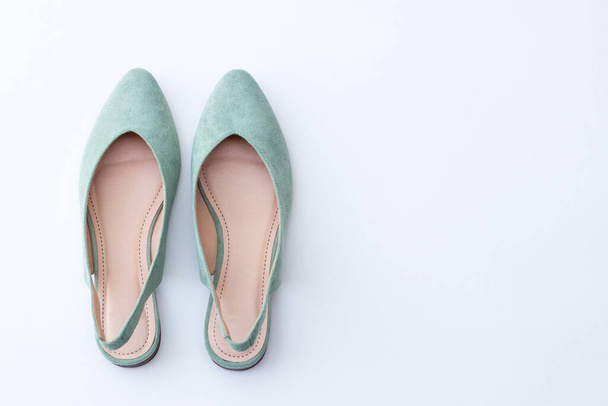 Woman's suede shoes in delicate mint color on a white - Photo, Image