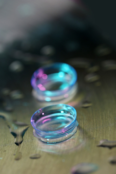 Contact lenses with water drops - Photo, image