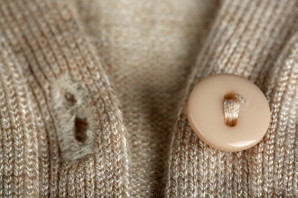 Button on clothes close up - Фото, изображение