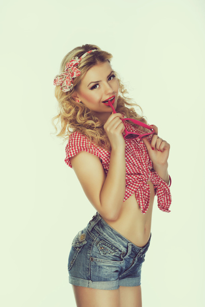Portrait of beautiful girl model in pin up - Photo, Image