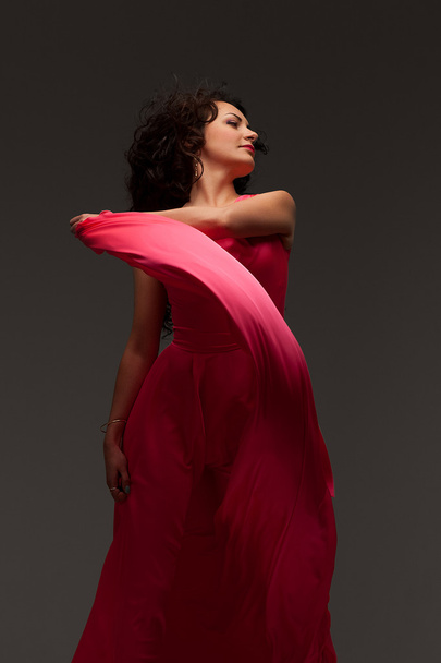 beautiful girl in a long pink dress - Fotografie, Obrázek