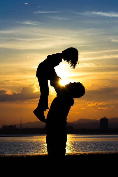 padre e hija en la playa - Foto, imagen