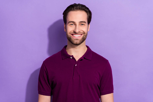 Photo of hooray millennial brunet guy wear purple t-shirt isolated on violet color background - Φωτογραφία, εικόνα