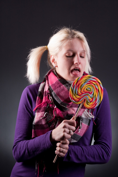 Жінка lollypop Холдинг
 - Фото, зображення