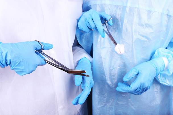 Surgeon's hands with instruments - Foto, Imagem