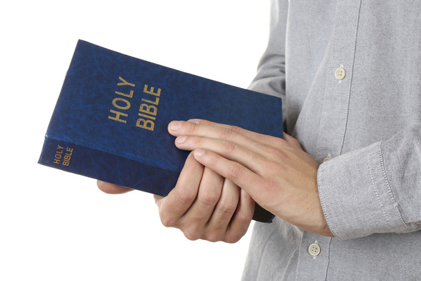 Man holding Bible - 写真・画像