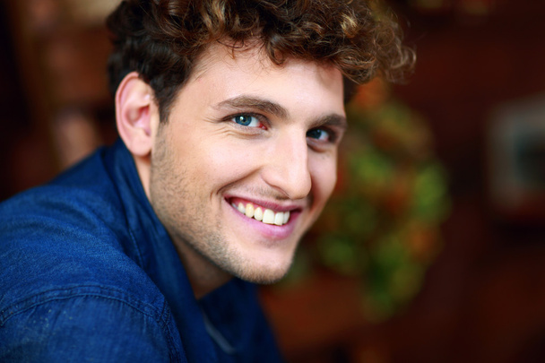Handsome man with curly hair - Photo, Image