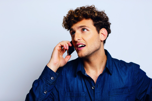 Handsome man with curly hair - Photo, image