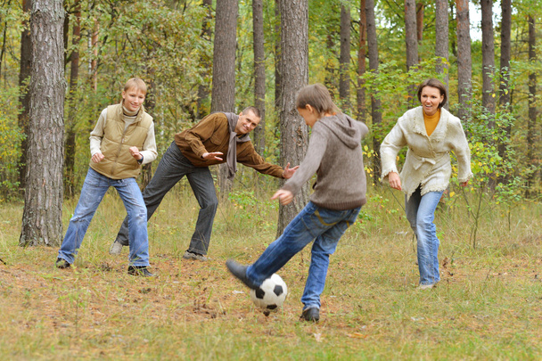 Family play football forest - Φωτογραφία, εικόνα