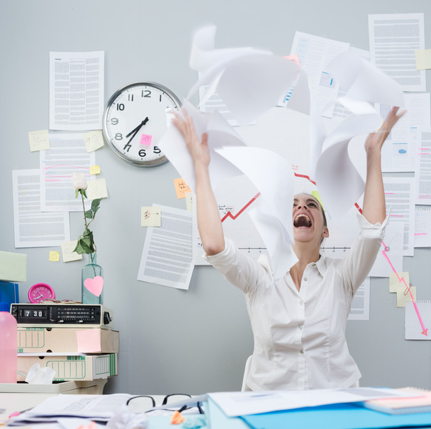 Angry businesswoman throwing paperwork in air - Fotografie, Obrázek