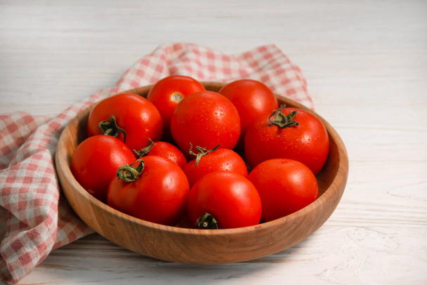 ripe tomatoes on wooden background - Фото, изображение
