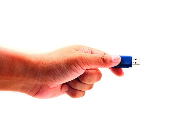 Hand holding USB data storage - Photo, image