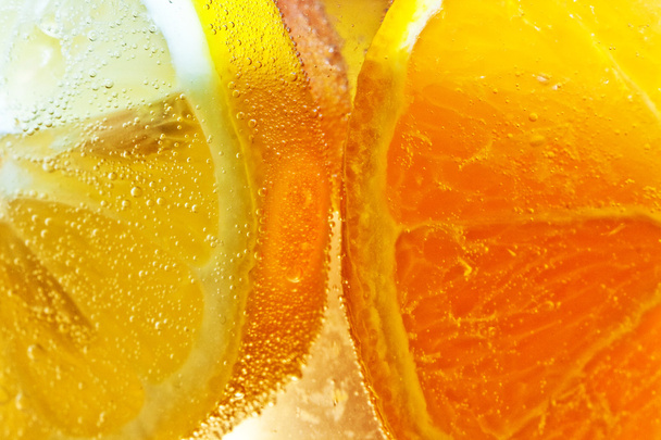 szeletelt narancssárga gyümölcs részletesen - Fotó, kép