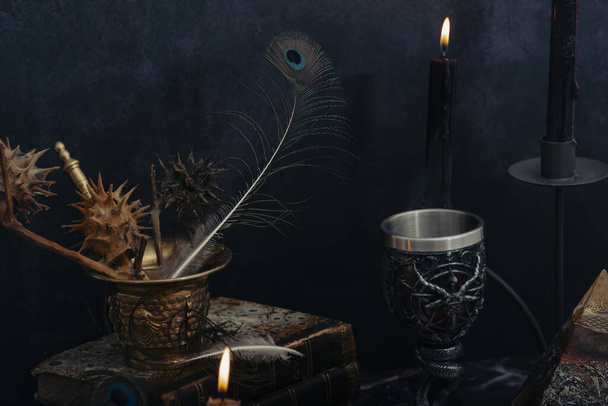 Satanic chalice for black mass preparation. dark background wallpaper. - Photo, Image