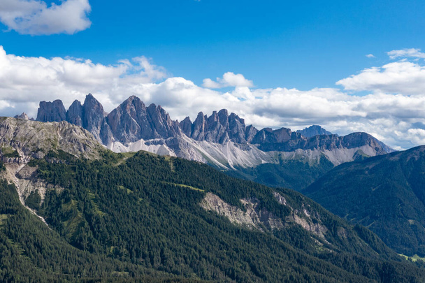Aerial Landscape of the Dolomites and a view of the Aferer Geisler Mountains in Italy. - Foto, Imagen