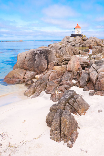 beautiful view of rocky sea coast and lighthouse - Fotó, kép