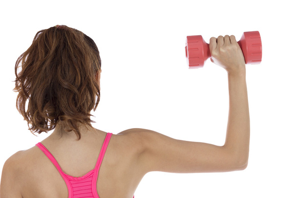 Fitness woman training her arms - 写真・画像