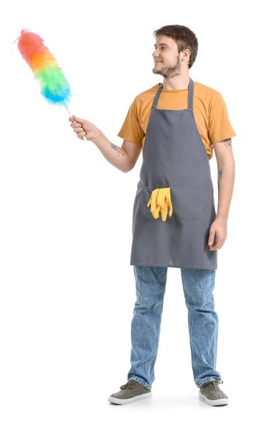 Young man with dust brush on white background - Photo, Image
