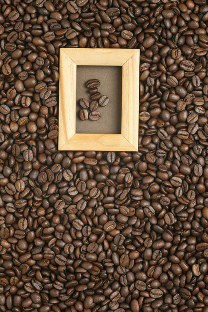 Caffe edition, coffee beans on old brown paper - Photo, Image