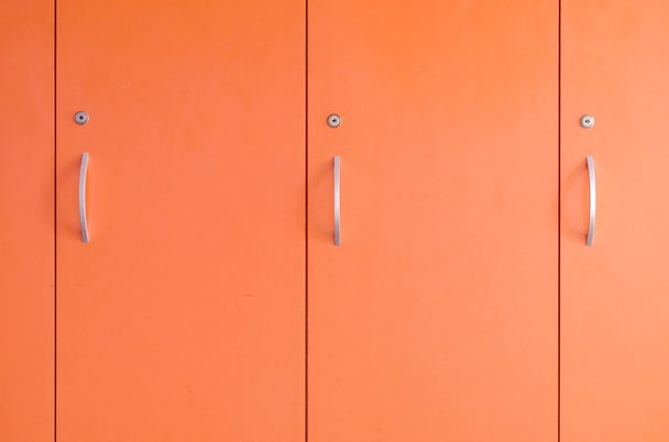 porte de casier orange
 - Photo, image