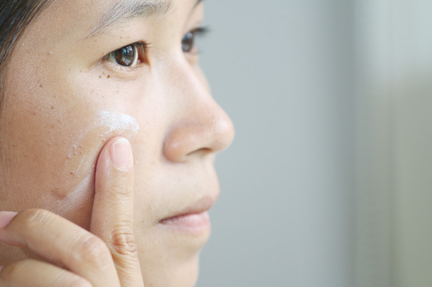 woman applying make up - Photo, Image
