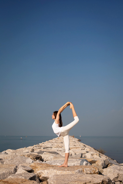 woman practicing yoga in nature - Foto, Imagem