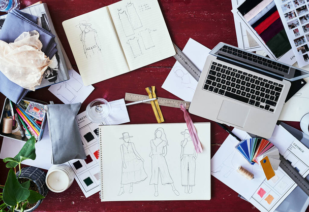 The life of a fashion designer. High angle shot of a fashion designers work desk. - Fotoğraf, Görsel