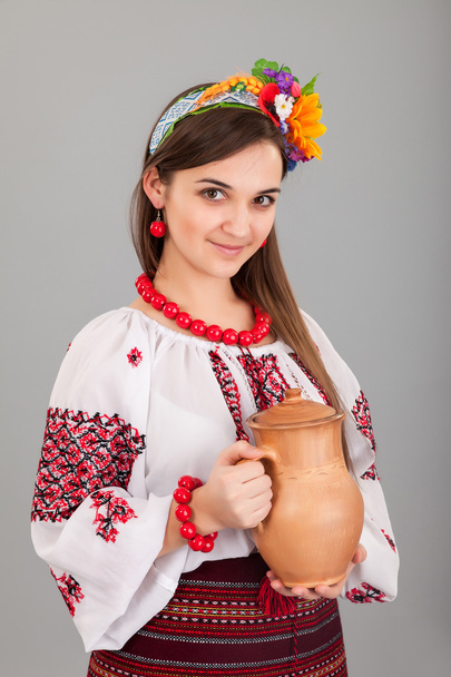 Ukrainian woman with jug - Valokuva, kuva