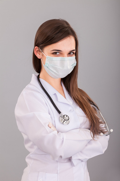 Nurse in surgeon mask. - Фото, изображение