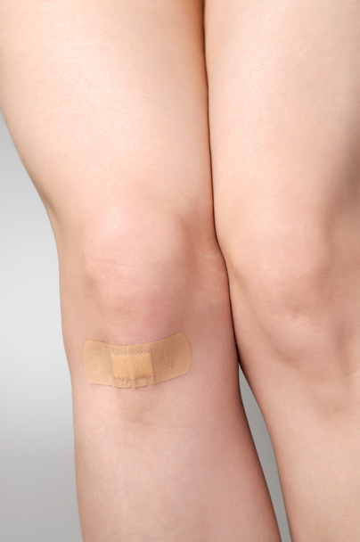 Plaster on female leg - Photo, Image