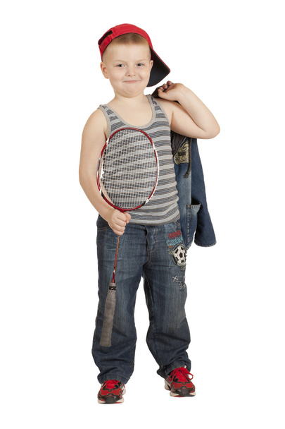 Pieni poika baseball-lippis päässä sulkapalloa varten
 - Valokuva, kuva