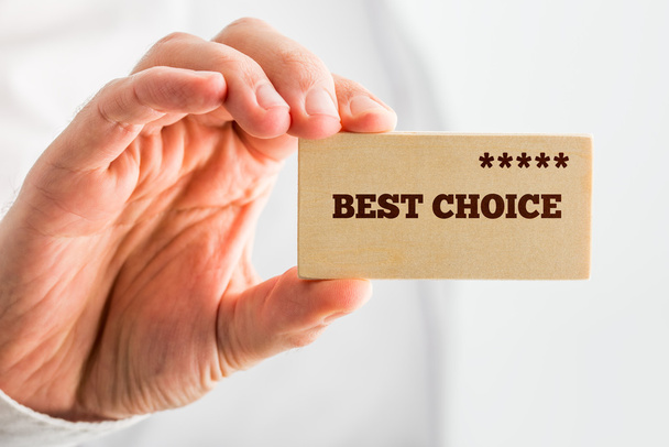 Man holding a wooden rectangle saying Best Choice - Photo, Image