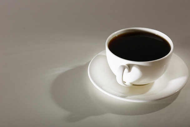 Cup of coffee on table - Фото, зображення