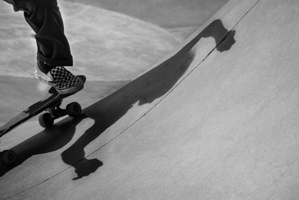 skateboarder practice tricks on the street - Photo, Image