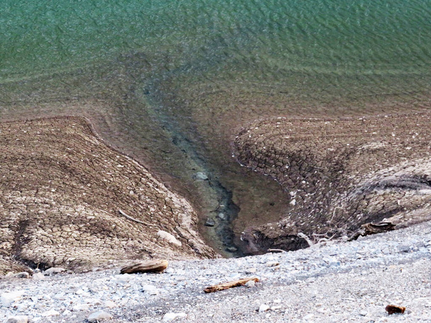Underwater sources on the reservoir lake Klontalersee (Kloentalersee or Klontaler lake) and in the Klontal alpine valley (Kloental or Klon valley) - Canton of Glarus, Switzerland / Schweiz - Photo, Image