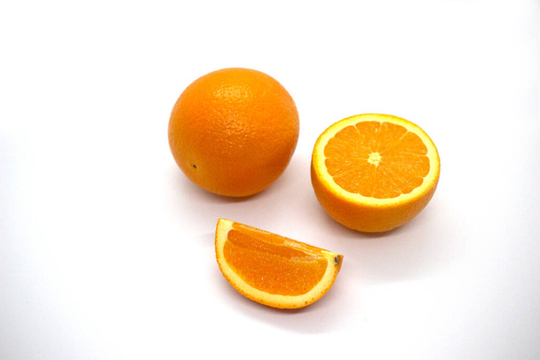 fresh orange fruit on a white background. flat lay - Фото, изображение