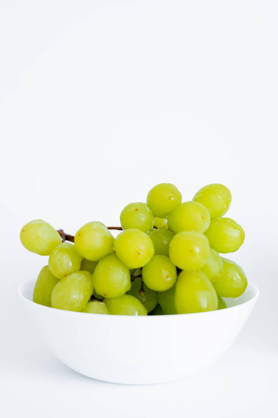 sweet green grapes in bowl on white - Foto, Imagem