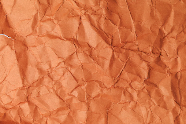 Rough crumpled texture surface of retro old vintage classic grunge paper. Background or backdrop. Design blank. Dark orange, Brown tone - Photo, Image