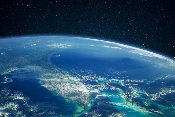 Planeta Tierra azul con océano y continentes en el espacio abierto en el cielo estrellado - Foto, Imagen