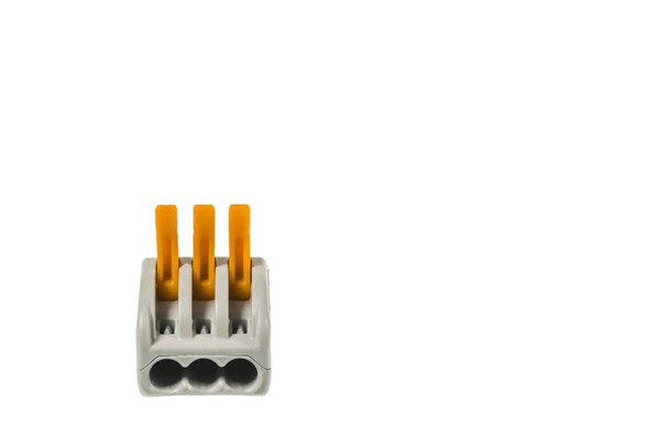 Close up view of three wires connector isolation on white background. Sweden. - Photo, Image
