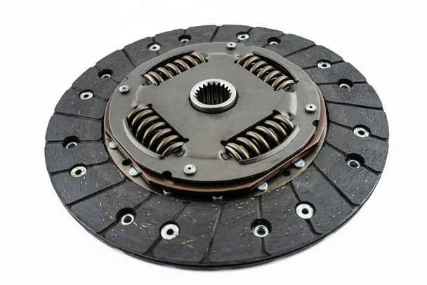 Used car clutch with damper springs and friction linings, isolated on a white background. - 写真・画像