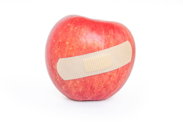 ragtapasz a vörös almához - Fotó, kép