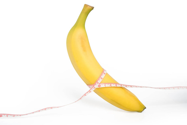измерить банан с линейкой, Концепция здорового питания - Фото, изображение