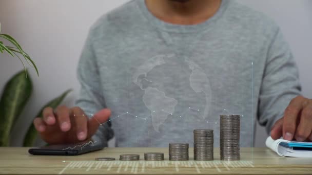 A men analysis business data hologram. business growth concept. coin stack increase. - Footage, Video