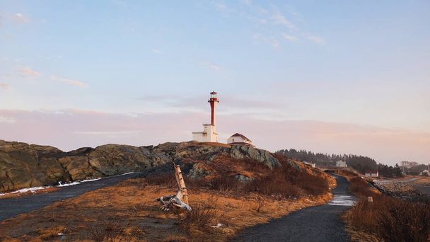 lighthouse on the beach  on nature background - Φωτογραφία, εικόνα