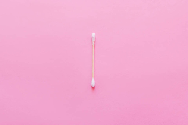 top view of hygienic ear stick on pink background - Zdjęcie, obraz