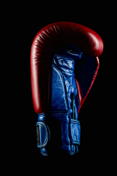 Boxing glove on balck - Foto, Imagen