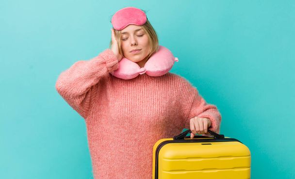 pretty blonde woman feeling bored, frustrated and sleepy after a tiresome. flight passenger concept - Fotografie, Obrázek