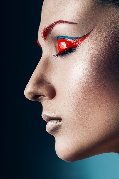 Pretty woman with red eyeshadows - Zdjęcie, obraz